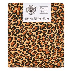 a brown and black animal print notebook with the words fabric tissue on it's cover