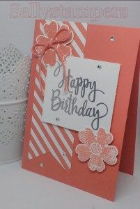 a happy birthday card with flowers on it