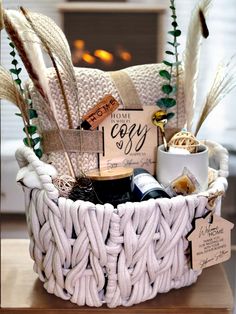 a white basket filled with lots of different items