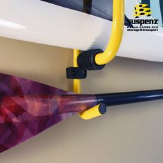 SUP Folding Wall Rack - Compact Storage Solution This Foldable SUP and Surfboard Wall Storage is great for tight places. These racks fold flat against the wall and out of the way when not in use thanks to the pivot hardware. Built-in hook provides additional storage perfect for paddles, towels, PFDs, etc. EconomicalEconomical storage solution that keeps your watercraft off the ground and out of the way. Pivot HardwareStorage racks mount directly to the wall with pivot hardware which allows them Paddle Board Storage, Under Deck Storage, Surfboard Rack, Deck Storage, Surfboard Wall, Under Decks, Folding Walls, Board Storage, Wall Rack