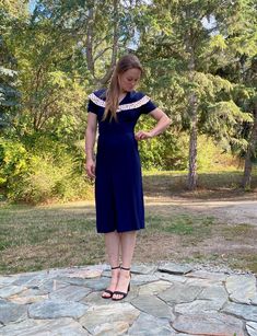 "Comfortable and classy crepe vintage navy dress with wide contrast polka dot sailor collar and V-neck opening. Three tucks on each side of the waist, darts at the back and side metal zipper for sleek fit. Below knee to mid calf length. Large central tuck starts at hem in front and goes up to about knee height for ease of movement. Repairs at central tuck area are barely visible. Meaurements, lying flat and unstretched: Shoulder to Shoulder - 36\" (91.4 cm) Bust -  36\" (91.4 cm) Waist -  28\" ( Blue Sailor Dress, Sailor Dress, Sailor Collar, Contrast Collar, Navy Dress, Metal Zipper, White Collar, Wool Jacket, Dress Clothes For Women