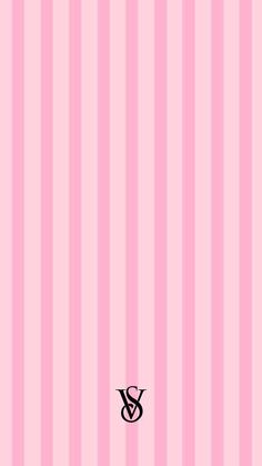 a pink striped wall with the letter s on it's side and a black symbol in the middle