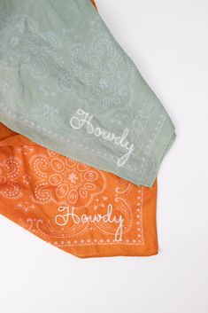 three bandannas with the words andyy and sandy written on them in white ink