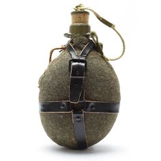 an olive colored wine bottle with strap around it