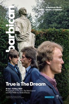 an advertisement for the movie true is the dream with three men standing in front of a statue