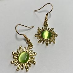 Super cute and well made earrings. Gold accents. Green Metal Earrings For Gift, Green Metal Clip-on Earrings For Gift, Cute Round Metal Earrings, Cute Adjustable Green Earrings, Trendy Green Crystal Earrings For Gift, Cute Handmade Metal Earrings, Cute Metal Earrings For Gifts, Cute Nickel Free Metal Earrings, Cute Nickel-free Metal Earrings