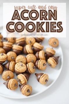 chocolate covered cookies on a white plate with the words super cute and easy acorn cookies