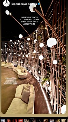 an image of a magazine cover with couches and lights on the wall in front of it