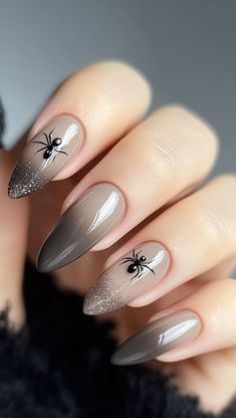 Matte black nails with hints of dark burgundy and deep purple create a vampy look perfect for Halloween night. Spider Nail Art Design, Elegant Halloween Nails, Spider Nails, Neutral Nail Art, Neutral Halloween, Taupe Nails, Sophisticated Manicure, Spooky Nails, Halloween Manicure