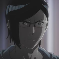 an anime character with glasses staring at the camera