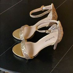 Gold Glitter Bebe High Heels. High Heels For Quinceanera, Wedding Shoes Gold, Gold Quince Shoes, Gold Quinceanera Heels, Formal Glitter Heels With Synthetic Material, Formal Synthetic Heels With Sequins, Formal Glitter Heels In Synthetic Material, Gold Sparkling Heels For Spring, Quince Heels Gold