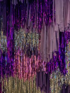 purple and gold sequins hanging from the ceiling