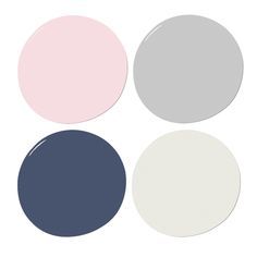 four different colors of paint arranged in the shape of circles on a white background, including pink, blue, and grey