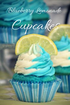 blueberry lemonade cupcakes with white frosting and a lime slice on top