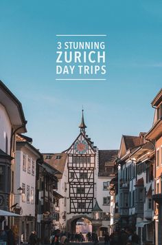 an old town with people walking down it and the words, 3 stunning zurch day trips