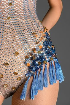 Capture attention in our rhinestone sheer fringe bodysuit in blue. This bodysuit features intricate rhinestone embellishments that sparkle and shine, adding a touch of glamour to your look. The sheer fringe detailing adds movement and flair. Perfect for concerts and performances, This bodysuit is a must-have for any Taylor Swift fan looking to channel her iconic style. Elevate your look with the Scafea Rhinestone Sheer Fringe Bodysuit and channel the style of Taylor Swift's unforgettable performances. Handmade customization Fabric composition: 90% polyester fiber, 10% spandex Washing method: hand wash or dry clean Popular elements: rhinestone Rhinestone Burlesque Costume, Taylor Swift Bodysuit, Fringe Bodysuit, Rhinestone Bodysuit, Embellished Bodysuit, Ropa Upcycling, Rhinestone Embellishments, Sparkle Dress, Sparkle And Shine