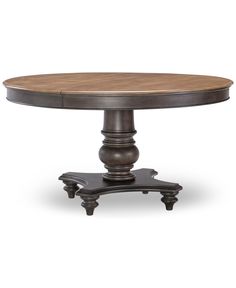 an oval dining table with two pedestals on each end, and a wooden top