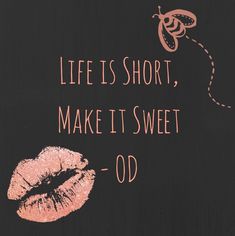 the words life is short, make it sweet od are painted on a black background