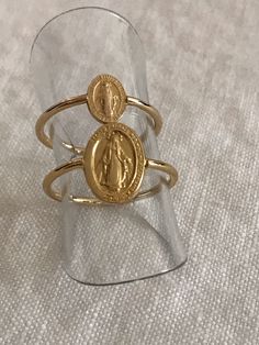 Holy Virgin Mary ring in PO (3 micron gold plated): Miraculous medal. 2 models: - large medal (1.10 cm) - small medal (0.70 cm) Sizes available: 48, 50, 52, 54, 56, 58 and 60. You will very easily find the right size for your finger with one of your rings and the photo converter. You can also ask a jeweler for your size. PS: the 2 models also exist in 925 silver. PS: Unavailable sizes will be back very soon. IF the correct size is not available to order, you can also request it by sending a simple message. (Without engagement!) Europe size to US size and UK size: ring size 48 => 15.3 mm in diameter => US size: 4.5 => UK size: I 1/2 ring size 49 => 15.6 mm in diameter => US size: 5 => UK size: J 1/2 ring size 50 => 15.9 mm in diameter => US size: 5.5 => UK size: K 1/2 ring size 51 => 16.2 m Virgin Mary Ring, Morganite Engagement Ring Set, Simple Silver Jewelry, Flower Engagement Ring, Sterling Silver Rings Set, Ruby Engagement Ring, Bridesmaid Jewelry Sets, Morganite Engagement, Morganite Engagement Ring