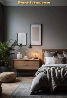 a bedroom with grey walls and white bedding, potted plants on the nightstand