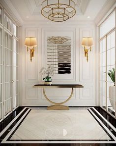 a room with white walls and black and white striped flooring that has a gold table in the center