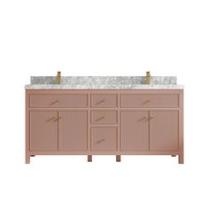 a bathroom vanity with two gold faucets on the top and marble counter tops