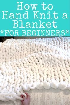 a baby's feet under a blanket with the words how to hand knit a blanket for beginners