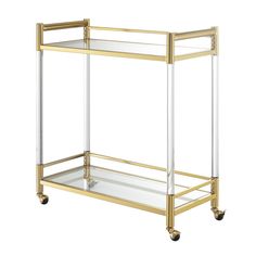 a gold and glass bar cart with wheels on the bottom, one shelf is empty