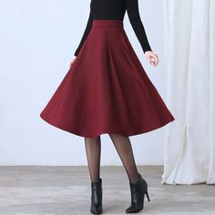 "★★ FEATURES * Wool skirt * Polyester lining * Two side seam pockets * Right zipper closure * pleated detail * Plus size full skirt * A Line Skirt * Perfect for Winter, autumn, spring * Dry clean ★★ The model is 170 cm (5′ 7″) tall with a 80 cm (31.5\") bust, 66 cm (26\") waist. She is wearing the red wool skirt in size XS. ★★ Bespoke Order Service If you Request other color Request the length Your height is not between 155 cm- 172 cm Your weight is over 75 kg I can do it for you, It will need s Retro A-line Winter Skirt, Red Pleated Skirt For Fall, Red Long Skirt For Fall, Red Winter Skirt With Relaxed Fit, Fall Red Lined Skirt, Retro Red Skirt For Fall, Red Full Skirt For Fall, Winter Wool A-line Skirt, Red Full Skirt Bottoms For Fall