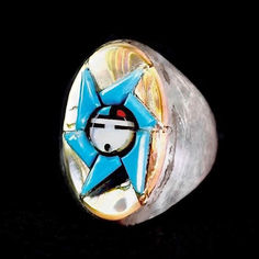 Inlay of Sun Face Kachina with Turquoise, Coral, Mother of Pearl and Jet Stones. Circa 1960s. One of a kind collectable old ring ! Would look great on both men and women.Size 10 3/4 Available at my Etsy Shop http://Far-Rider-West.com   #westerngifts #cowboy #nativeamerican #indianjewelry #Zuniring #vintagerings #turquoisering #chunkymensring #uniquejewelry #handmadejewelry #ArtisanCrafted