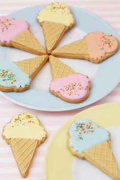 ice cream and sprinkle decorated cookies on a plate