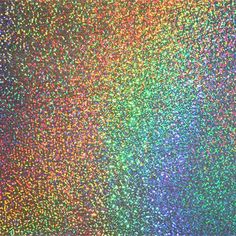 a rainbow colored background with lots of small dots