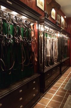 a room filled with lots of different types of horse tacks