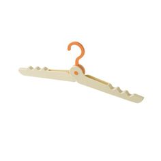 an orange and white plastic hanger on a white background with clipping for clothes