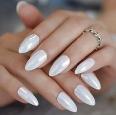 Discover the top 23 white chrome nails for 2024, from milky hues to iridescent finishes. Explore our curated selection of sophisticated almond, elegant coffin, and chic short square designs. Embrace the latest nail trends that blend timeless elegance with modern twists for your most stylish year yet. Perfect for fashion-forward individuals looking to make a statement with their manicure. Get inspired with our guide to the must-have white chrome n Pink Holographic Nails, Mirror Nails, Unicorn Nails, Nagel Tips, Fake Nail, Holographic Nails, Artificial Nails, Chrome Nails