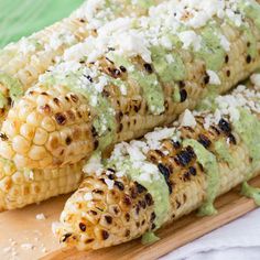 grilled corn on the cob with avocado and feta cheese