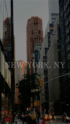 a woman walking down the street in new york city, with tall buildings behind her