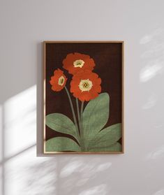 a painting hanging on the wall next to a window