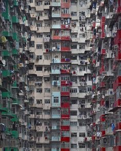 an aerial view of many buildings with balconies on the top and bottom floors