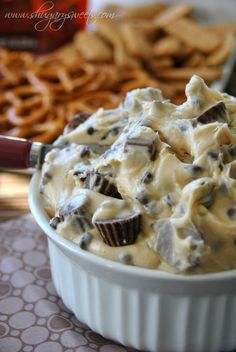 a cup filled with ice cream and chocolate chips