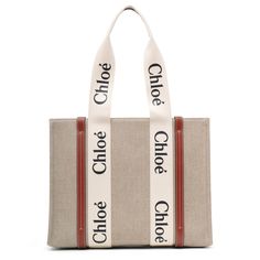 White and brown linen canvas tote bag from Chloé. The Medium Woody bag is made of linen canvas detailed with contrasting vertical leather strips, along with the signature Chloé logo ribbon. It is complete with a main compartment designed to fit your mobile phone.Measurements: L37 x H26 x W12 cm Made in Italy Designer Canvas Shoulder Bag With Large Capacity, Designer Beige Canvas Bag, Designer Tote Canvas Bag For Errands, Designer Canvas Tote Bag For Errands, Designer Canvas Shoulder Bag For Errands, White Designer Bag With Canvas Lining, Designer White Bags With Canvas Lining, Designer White Bag With Canvas Lining, Designer Canvas Tote Bag For Daily Use