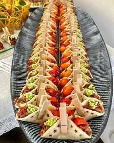 a long platter filled with lots of food