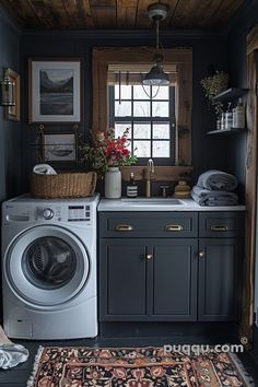 a washer and dryer in a small room with wood paneling on the walls