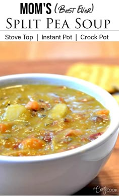 a white bowl filled with soup on top of a wooden table