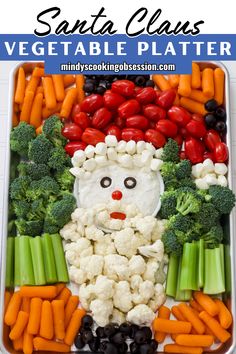 This easy Santa Claus Veggie Tray is a fun and festive way to serve fresh vegetables at a Christmas party! Made with just a few ingredients, this quick setup can be customized with your favorite veggies and dip. Not only is this Santa Claus Veggie Tray a delicious treat, but it also makes a festive centerpiece that adds holiday cheer to any gathering! Packed with fresh vegetables, this tray is the perfect healthy option for any holiday party. Veggie Tray For Christmas Party, Santa Veggie Platter, Veggie Tray For Christmas, Christmas Veggie Tray Ideas Simple, Vegetable Christmas Tree Platter, Snowman Veggie Tray, Santa Food Ideas, Christmas Relish Tray Ideas, Veggie Christmas Platter