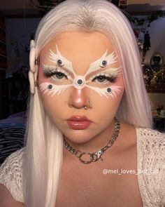 biblically accurate angel makeup  not mine! IG: mel_loves_her_cat Makeup Only Costumes, Angel Cosplay Female, Makeup Ideas Angel, 2024 Halloween Makeup Ideas, Fallen Angel Makeup Halloween Eye, Gothic Angel Makeup, Creepy Angel Makeup, Angel Wing Eye Makeup, Angel Accurate