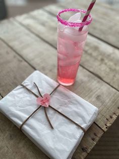 a drink on a napkin with a straw in it