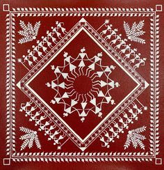 a red cloth with white designs on it