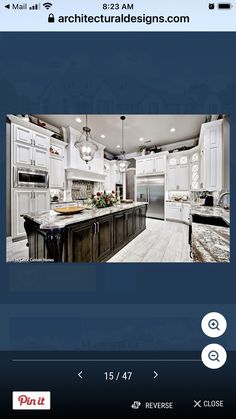 an image of a kitchen with white cabinets and granite counter tops on the phone screen