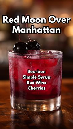 the red moon over manhattan cocktail is garnished with cherries